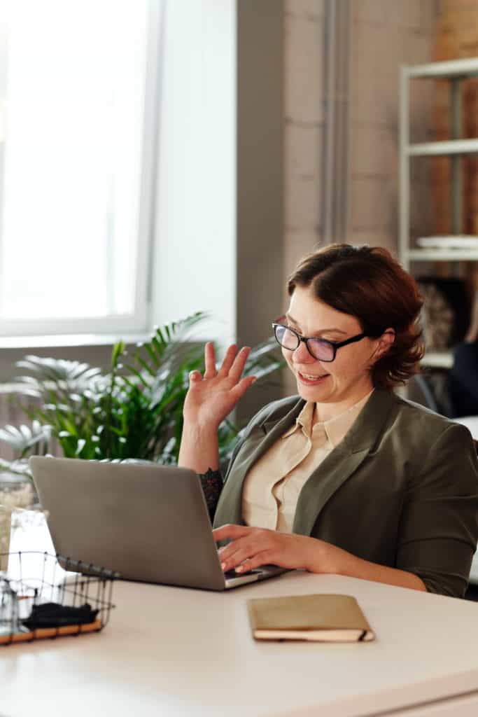 woman remote worker on laptop on video call